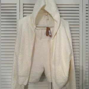 This is the Cozy Knit Zip Up Hoodie & Cozy Knit Short from Skims.